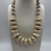 Collier Brigitte beige face Collier Brigitte beige face