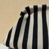 Zoom pochette Aélia à rayures